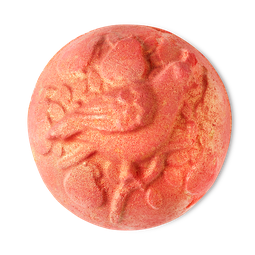 A large dark green rounded hexagonal shaped bath bomb that has a large bright green 3d partridge's head coming out of the top of it and some gold lustre on it, on a white background.