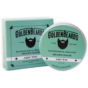 A short cylindrical silver metallic tin with a silver metallic lid and a bright green label that has Golden Beards Artic Beard Balm written in bold black writing and a picture of a Beard on it, on a white background.