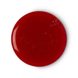A medium circular puddle of some dark burgundy shower gel that has some silver lustre running through it, on a white background.