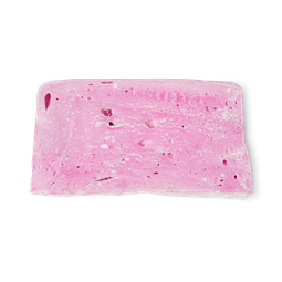 Snow Fairies Falling, Falling From The Sky | Lush Christmas 2022 Range | Body Lotion, Body Wash, Shower Bomb & Shower Gels A small bright pink rectangular block of soap that has some bright white cornflower on top of it, on a white background.