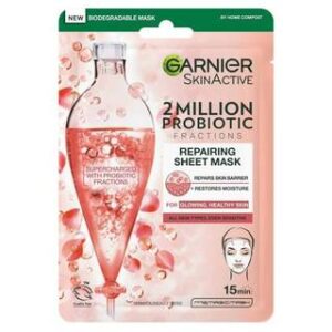 A tall rectangular bright pink plastic pouch that has Garnier written in dark green writing, SkinActive Probiotic Derived Fractions Sheet Mask written in bold black writing, and a picture of a teardrop shaped glass bottle on it, on a white background.