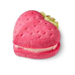 'Cause Your Love Gets Me More Buzzed Than Pink Champagne | Lush Valentine's Day 2023 Range A bright Red Strawberry shaped Bubbleroon with a dark green stem and a cut In the middle of it that's filled with some bright white Cocoa Butter, on a white background.