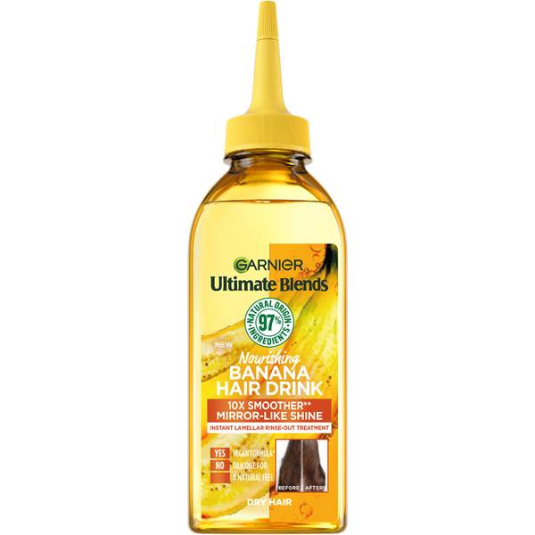 My Hair Could Always Do With A Nice Nourishing Drink | Garnier Ultimate Blends Hair Drink Nourishing Banana Liquid Conditioner A tall rectangular bright yellow plastic bottle with a bright yellow plastic lid that has Garnier written in bright green writing and Ultimate Blends Hair Drink Nourishing Banana Liquid Conditioner written in bright white writing on it, on a white background.