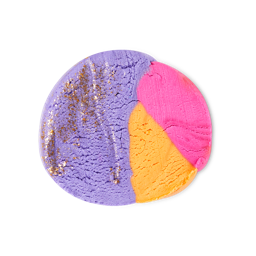A large bright orange, pink and purple cylindrical block of Plasticine, on a white background.