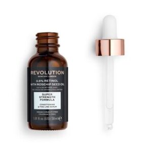 A short cylindrical brown glass bottle with a gold and white Rubber Pipette Lid and a black label that has Revolution Skincare 0.5% Retinol & Rosehip Seed Oil Smoothing Serum written in bright white writing on it, on a white background.
