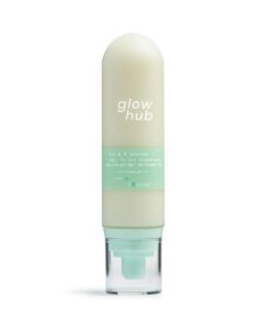 A tall cylindrical dome shaped clear plastic bottle full of some creamy white liquid with a clear plastic lid and a bright green label that has Glow Hub Calm & Soothe Gel To Oil Cleanser written in bright white writing on it, on a white background.