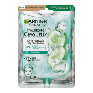 A tall rectangular shiny silver plastic pouch that has Garnier SkinActive Anti-Fatigue Hyaluronic Acid & Icy Cucumber Face Mask written in bold black writing and a picture of a slice of bright green Cucumber and some cubes of white ice on it, on a white background.