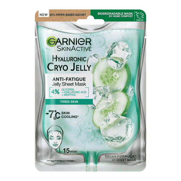 A tall rectangular shiny silver plastic pouch that has Garnier SkinActive Anti-Fatigue Hyaluronic Acid & Icy Cucumber Face Mask written in bold black writing and a picture of a slice of bright green Cucumber and some cubes of white ice on it, on a white background.