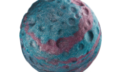 A medium metallic purple spherical asteroid shaped bath bomb that has some bright blue swirls and some silver lustre all over it, on a white background.