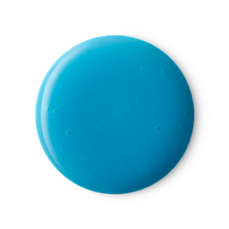 A medium circular puddle of some pastel blue shower gel, on a white background.