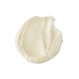 A medium circular puddle of some creamy white sun cream that has some gold lustre running through it, on a white background.