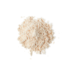 A medium circular puddle of some creamy white powder, on a white background.