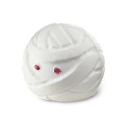 A medium bright white spherical mummy’s head shaped bath bomb that has some bright white Bandages all over it and some bright red Eyes engraved on it, on a white background.
