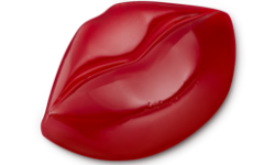 A medium bright red puckered lips shaped block of Shower Jelly, on a white background.
