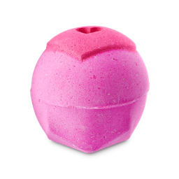A medium Hot Pink circular hexagonal shaped bath bomb that has a love heart engraved on the top of it and a hole in the middle of it, on a white background.