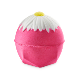 You Are Beautiful, No Matter What They Say | Lush Mother's Day 2024 Range A medium bright Pink hexagonal spherical shaped Bath Bomb that has a bright white flower engraved on it, on a white background.