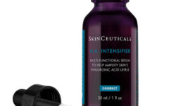 A short cylindrical dark purple glass bottle with a white rubber pipette lid and a white label that has Skinseuticals H.A. Hyaluronic Acid Intensifier Serum written in bold black writing on it, on a white background.