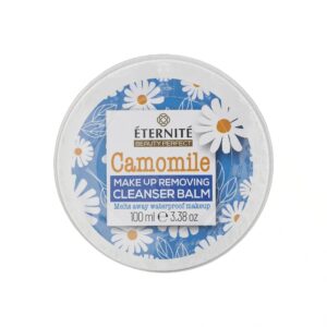 A medium circular metallic dark blue tin with a bright white label that has Éternité Beauty Perfect Chamomile Make Up Removing Cleansing Balm written in bright white writing and some pictures of some bright yellow chamomile flowers on it, on a white background.