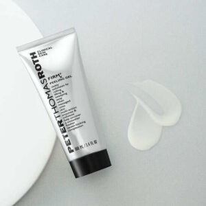 - [ ] A tall conical bright silver plastic Tube with a black plastic lid that has Peter Thomas Roth written in bright silver writing and FIRMx® Peeling Gel written in bold black writing on it next to a medium circular puddle of some translucent white liquid, on a white background.