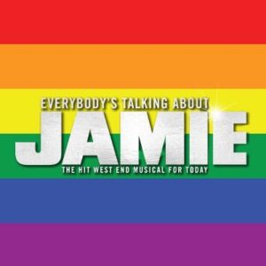 A poster that has everybody’s talking about Jamie written in bright white writing on a multicoloured rainbow background that includes, red, orange, yellow, green, blue and purple.
