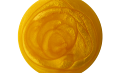 A medium circular puddle of some glossy glittery golden yellow shower gel, on a white background.