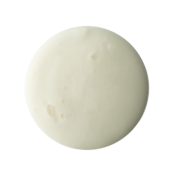 A medium circular puddle of some glossy creamy ivory shower gel, on a white background.