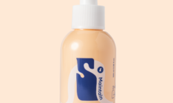 A short cylindrical light peach plastic bottle with a bright white plastic pump lid and a bright blue label that has Savaip Gel-To-Milk Cleanser written in bright white writing on it, on a white background.
