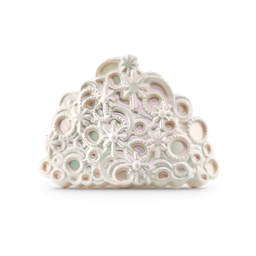 A large golden yellow tiara crown shaped block of soap that’s covered in some bright pearlescent lustre, on a white background.