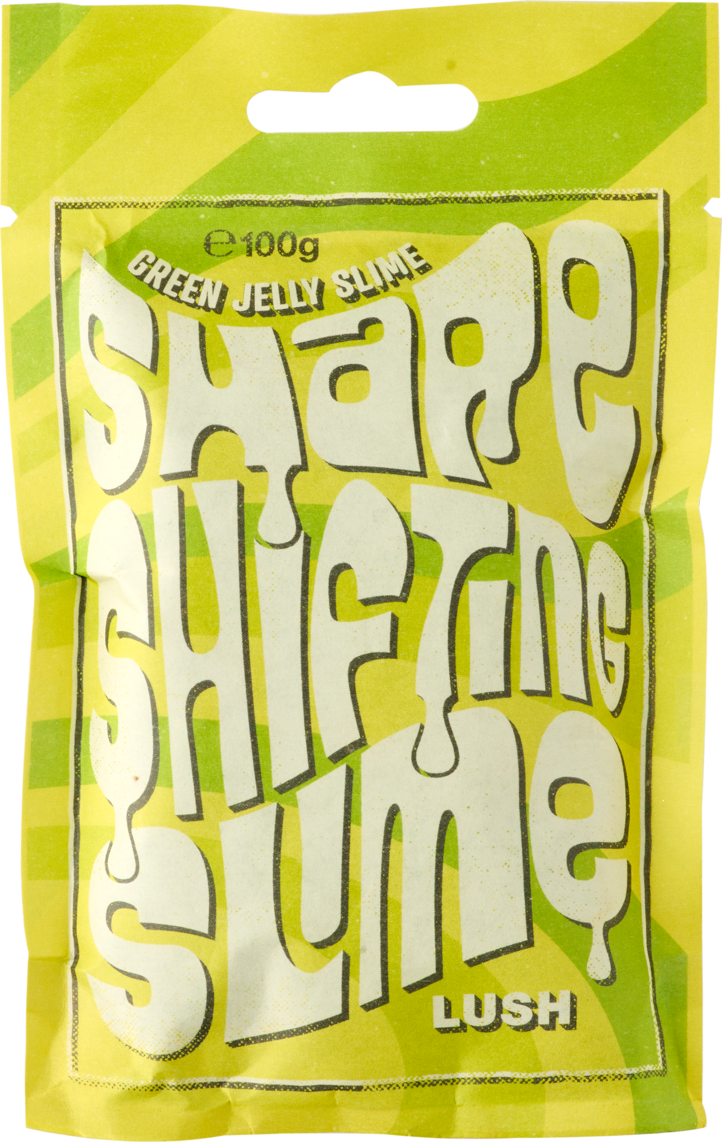Trick Or Treat, Baby On A Night Like This | Lush Tricks Range A medium rectangular gradient bright green and yellow paper pouch that has Lush Shape Shifting Slime Green Jelly Slime written in bright white writing on it, on a white background.