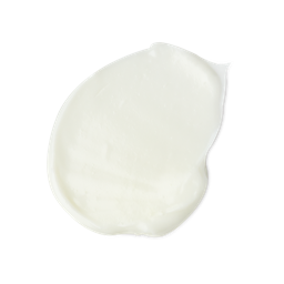 A medium circular puddle of some glossy ivory facial wash, on a white background.