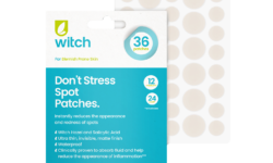 A medium rectangular gradient bright blue and white cardboard pouch that has Witch Don’t Stress Spot Patches written in bright teal writing and a picture of a dark green leaf on it, on a white background.