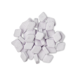 A small pile of some pastel purple rounded diamond shaped mouthwash tabs, on a white background.