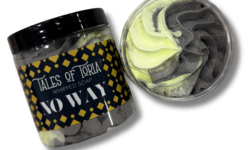 A tall cylindrical clear plastic tub full of some gradient bright grey and light yellow whipped soap with a black plastic lid and a dark blue label that has Tales of Toria No Way Whipped Soap written in bright white writing and some pictures of some bright yellow diamonds on it, on a white background.