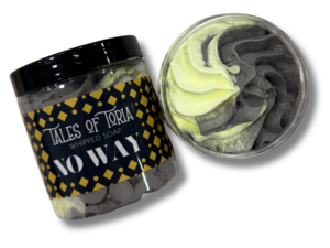 A tall cylindrical clear plastic tub full of some gradient bright grey and light yellow whipped soap with a black plastic lid and a dark blue label that has Tales of Toria No Way Whipped Soap written in bright white writing and some pictures of some bright yellow diamonds on it, on a white background.