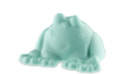 A large translucent pastel green frog shaped block of shower jelly, on a white background.