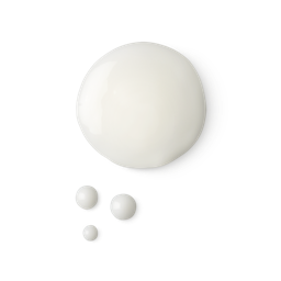 A medium circular puddle of some translucent creamy white conditioning spray, on a white background.