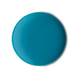A medium circular puddle of some thick glossy Teal Shower Gel, on a white backghround.