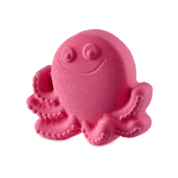 A small gradient bright pink octopus shaped bath bomb that has a wide smile, some big eyes and some octopus suckers engraved on it, on a white background.