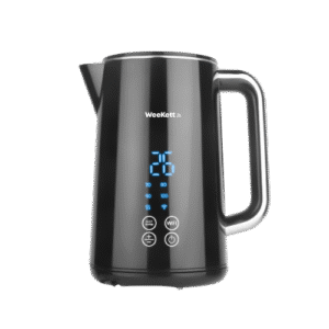 A tall cylindrical black plastic Kettle with a Black Plastic Handle that has WeeKett written in bold black writing on it on top of a large circular metallic silver base that has six silver buttons and some bright blue lights on it, on a white background.