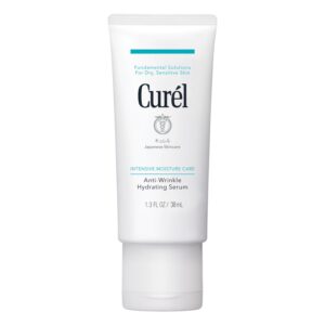 A short cylindrical squeezy frosted white plastic Tube with a frosted white plastic Lid that has Curél Anti-Wrinkle Hydrating Serum written in bold dark blue writing on it, on a white background.