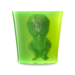 We All Know Conspiracies Are Dumb. What If People Knew That These were Real | Lush Halloween 2025 Range A tall cylindrical translucent lime green block of shower jelly that has a small dark green alien shaped block of shower gummy suspended in the centre of it, on a white background.