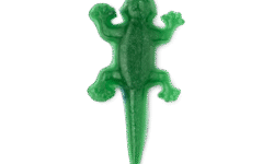 A small bright green lizard shaped block of Facial Gummy Wash that has some bright silver lustre all over it, on a white background.