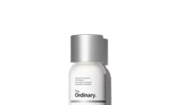 A short cylindrical bright white plastic bottle with a matte silver plastic lid that has The Ordinary Sulfur 10% Powder-To-Cream Concentrate written in bold black writing on it, on a white background.
