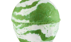 A medium gradient bright green and white rounded hexagonal shaped bath bomb that has a swirl pattern all over it, on a white background.