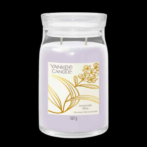 A tall cylindrical glass Jar full of some pale lavender Wax with a bright white label that has Yankee Candle written in bold black writing, Lavender Bliss written in bold black writing, and a picture of some stylised bright gold lavender flowers and leaves on it, on a white background.
