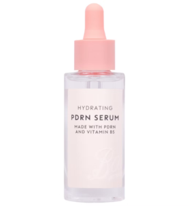 A short rounded rectangular glass bottle full of some clear Facial Serum with a light pink rubber pipette lid and a white label that has Boots Hydrating PDRN Serum written in bold black writing on it, on a white background.