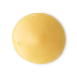 A medium circular swatch of some thick, glossy creamy yellow shower gel, on a white background.