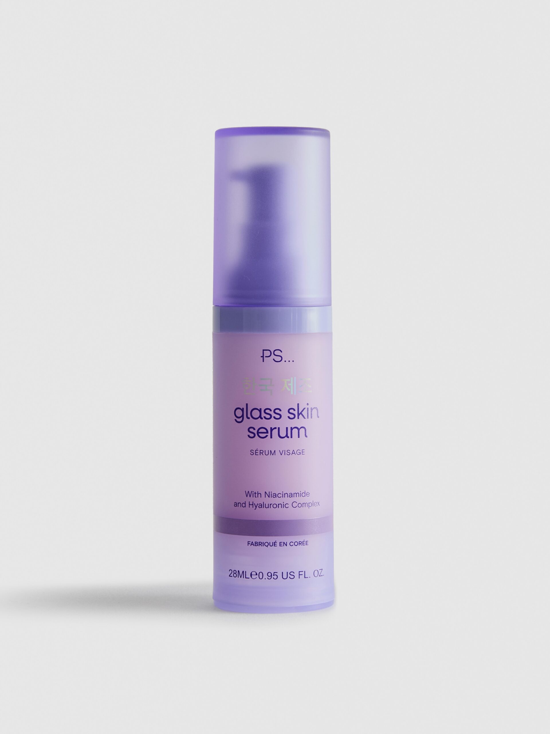 Psst! I Know How You Can Get Glass Skin On A Budget | Primark PS... Glass Skin Range A short cylindrical bright Purple Bottle with a bright purple pump lid that’s covered by a matte semi-translucent purple plastic cap lid that has Primark PS… Glass Skin Face Serum written in dark purple writing on it, on a white background.