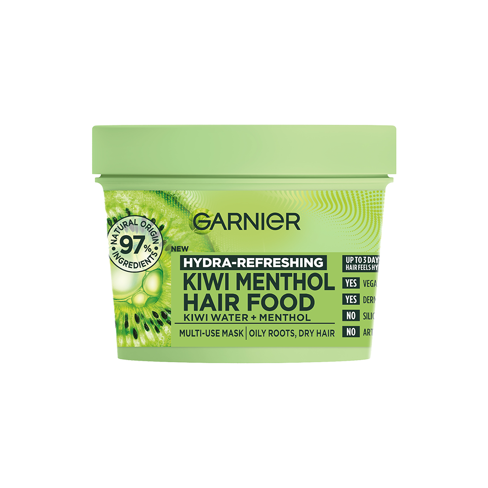 A short cylindrical light green plastic tub with a light green lid and a gradient light green and dark green label that has Garnier Hair Food Kiwi Menthol Multi-Use Mask written in dark green writing and a picture of a dark green slice of kiwi fruit on it, on a white background.