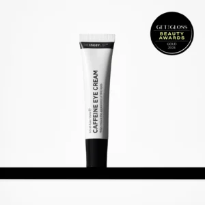 A tall thin and conical bright white plastic tube with a black plastic lid that has The INKEY List Caffeine Eye Cream written in bold black writing and a picture of a black stripe on it, on a white background.